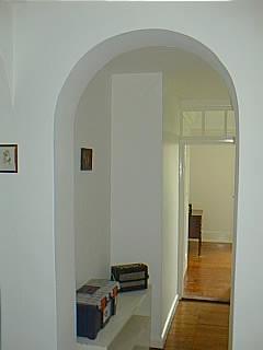 Hall to passage to bedroom 1.